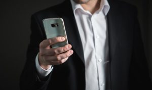 man holding phone